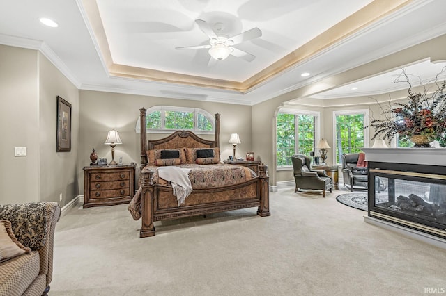 1411 Santanna Dr, Lafayette, IN 47905 - bedroom featuring carpet floors, a tray ceiling, baseboards, and crown molding