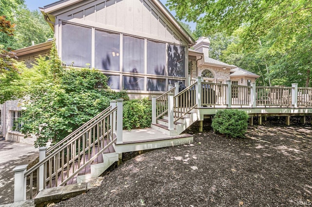 1411 Santanna Dr, Lafayette, IN 47905 - rear view of property with stairway, a sunroom, a deck, and board and batten siding