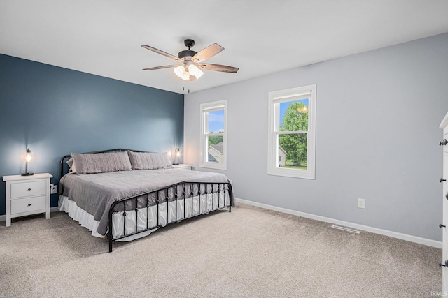 55177 Ardith St, Osceola, IN 46561 - carpeted bedroom with baseboards and a ceiling fan