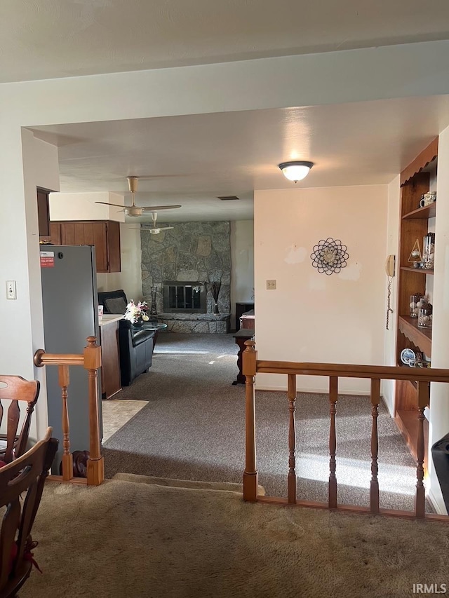 416 Hopkins Rd, Indianapolis, IN 46229 - living area featuring carpet flooring, a fireplace, and ceiling fan