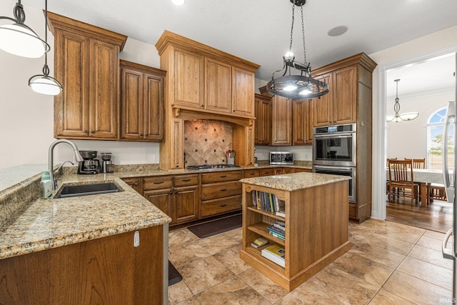 4906 N 100 W, Uniondale, IN 46791 - kitchen featuring a sink, appliances with stainless steel finishes, light stone counters, brown cabinets, and crown molding