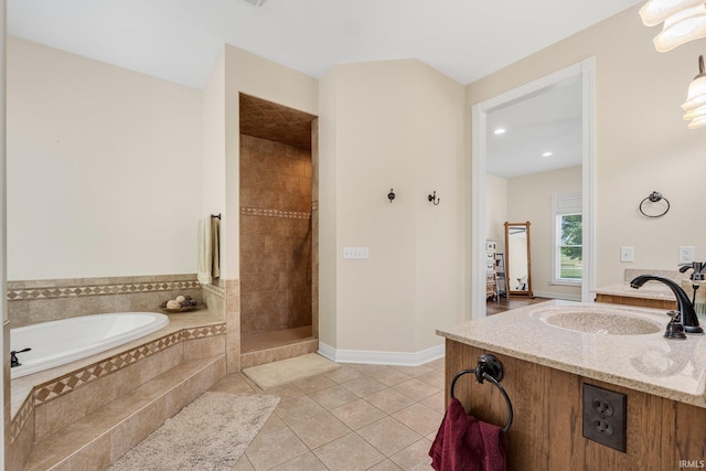 4906 N 100 W, Uniondale, IN 46791 - bathroom featuring tile patterned floors, a bath, vanity, a tile shower, and recessed lighting