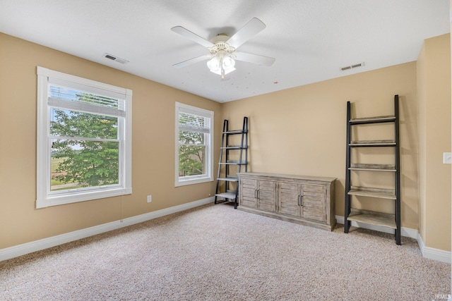 4906 N 100 W, Uniondale, IN 46791 - carpeted spare room with baseboards and a ceiling fan