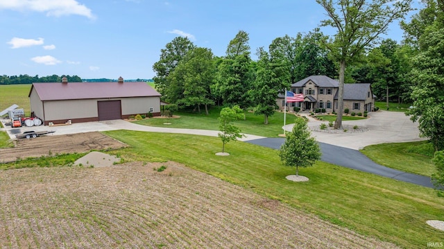 4906 N 100 W, Uniondale, IN 46791 - view of grassy yard featuring an outdoor structure and a garage