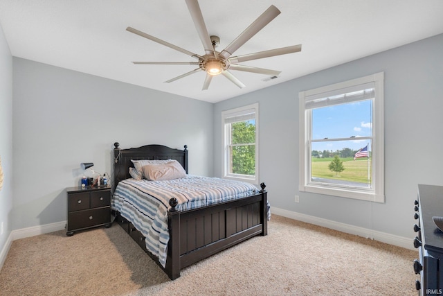 4906 N 100 W, Uniondale, IN 46791 - bedroom with baseboards, light colored carpet, and a ceiling fan