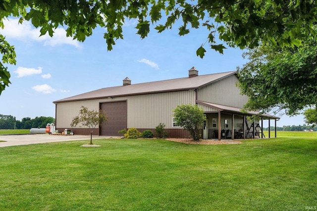 4906 N 100 W, Uniondale, IN 46791 - view of home's exterior with a yard and metal roof
