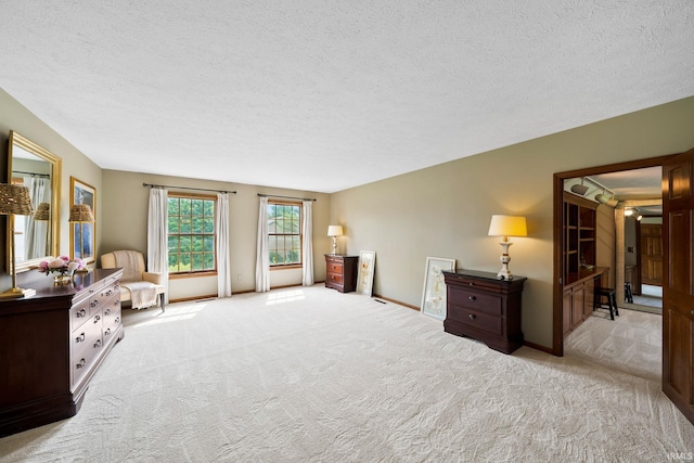 51803 Foxdale Ln, Granger, IN 46530 - bedroom featuring carpet, a textured ceiling, and baseboards