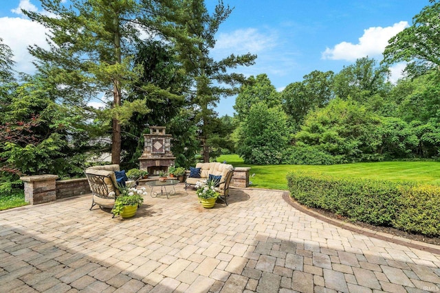 51803 Foxdale Ln, Granger, IN 46530 - view of patio with an outdoor living space with a fireplace