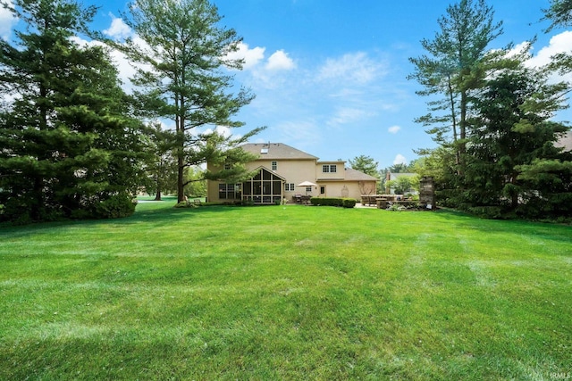 51803 Foxdale Ln, Granger, IN 46530 - view of green lawn featuring a sunroom