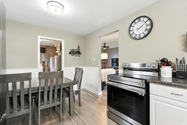 9014 Muldoon Rd, Fort Wayne, IN 46819 - dining space with light wood-style flooring