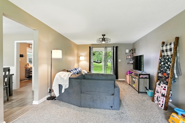 9014 Muldoon Rd, Fort Wayne, IN 46819 - living room featuring light carpet and baseboards