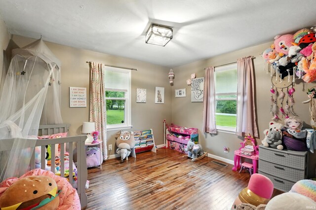 9014 Muldoon Rd, Fort Wayne, IN 46819 - playroom with wood-type flooring and baseboards