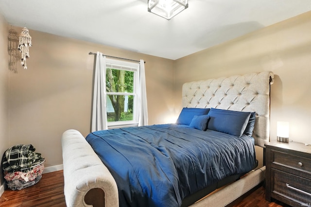 9014 Muldoon Rd, Fort Wayne, IN 46819 - bedroom with dark wood-style floors and baseboards