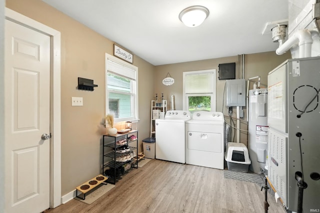 9014 Muldoon Rd, Fort Wayne, IN 46819 - washroom featuring water heater, washer and clothes dryer, light wood-style floors, and heating unit