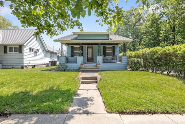 1218 S Twyckenham Dr, South Bend, IN 46615 - bungalow featuring a porch and a front lawn