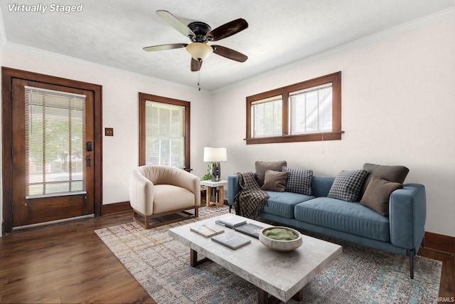 1218 S Twyckenham Dr, South Bend, IN 46615 - living area with dark wood-style floors, crown molding, a ceiling fan, and baseboards