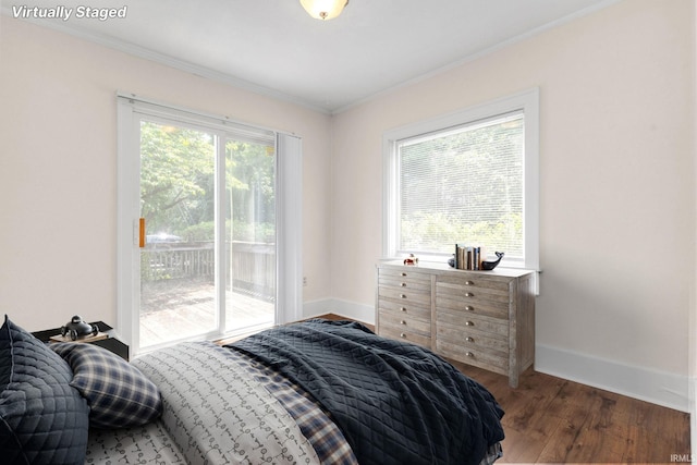 1218 S Twyckenham Dr, South Bend, IN 46615 - bedroom featuring access to outside, baseboards, ornamental molding, and wood finished floors
