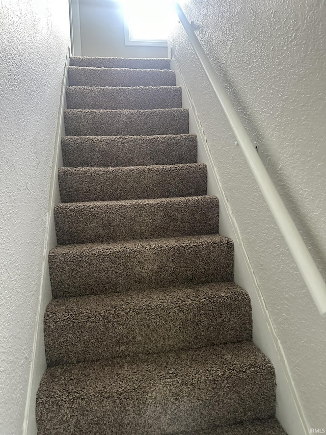 3324 Alexander St, Fort Wayne, IN 46806 - stairs featuring a textured wall