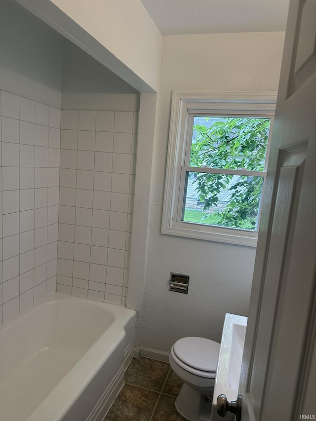 3324 Alexander St, Fort Wayne, IN 46806 - full bath with toilet, baseboards, and tub / shower combination