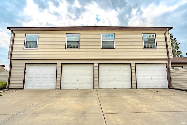 3208 Hanover Dr Unit 17-D, Lafayette, IN 47909 - garage featuring concrete driveway