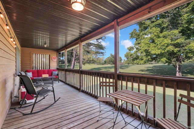 9617 S Lake Ridge Dr Unit 4, Bloomington, IN 47401 - wooden terrace featuring outdoor lounge area and a yard