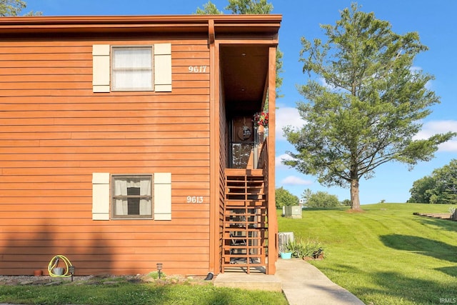 9617 S Lake Ridge Dr Unit 4, Bloomington, IN 47401 - view of front of property with a front yard and stairs