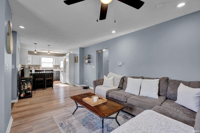 9617 S Lake Ridge Dr Unit 4, Bloomington, IN 47401 - living area featuring ceiling fan, light wood finished floors, baseboards, and recessed lighting