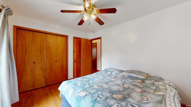 7333 W Newton Stewart Rd, Taswell, IN 47175 - bedroom featuring wood finished floors and a ceiling fan