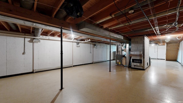 7333 W Newton Stewart Rd, Taswell, IN 47175 - unfinished basement with tile patterned floors and heating unit
