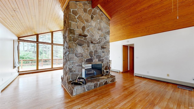 7333 W Newton Stewart Rd, Taswell, IN 47175 - living room with wooden ceiling, hardwood / wood-style floors, high vaulted ceiling, baseboards, and a fireplace
