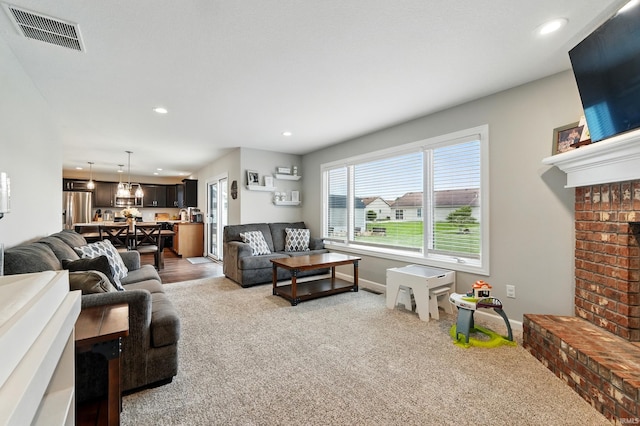1308 Hideaway Dr, Auburn, IN 46706 - carpeted living room with recessed lighting, baseboards, and a fireplace