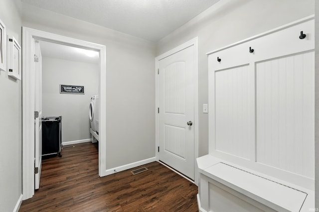 1308 Hideaway Dr, Auburn, IN 46706 - mudroom featuring dark wood-type flooring, baseboards, and washer / dryer