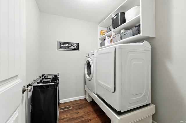 1308 Hideaway Dr, Auburn, IN 46706 - washroom with washing machine and clothes dryer, dark wood-style floors, and baseboards