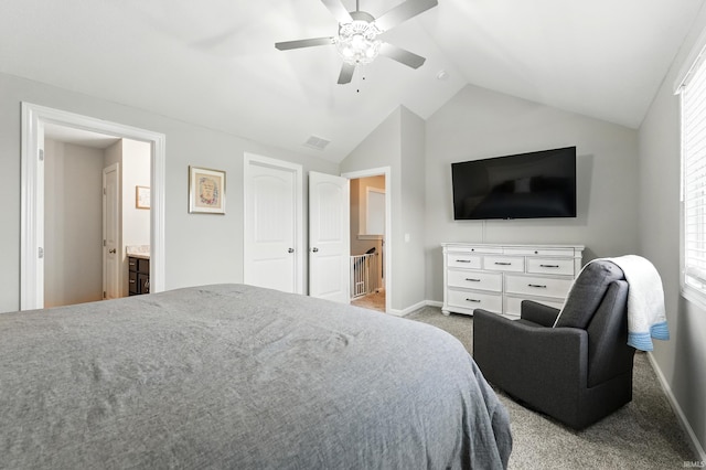 1308 Hideaway Dr, Auburn, IN 46706 - carpeted bedroom featuring vaulted ceiling, baseboards, ceiling fan, and multiple windows