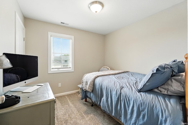 1308 Hideaway Dr, Auburn, IN 46706 - bedroom featuring light colored carpet, baseboards, and a desk