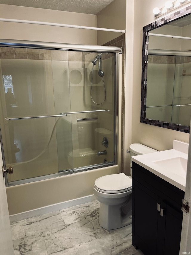 336 Wilmington Ct Unit C, Bloomington, IN 47401 - bathroom featuring vanity, toilet, and enclosed tub / shower combo