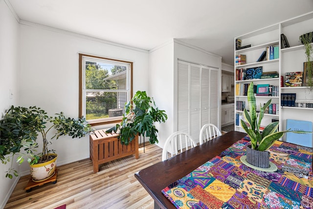 1330 Helmen Dr, South Bend, IN 46615 - dining space with wood finished floors, ornamental molding, and baseboards