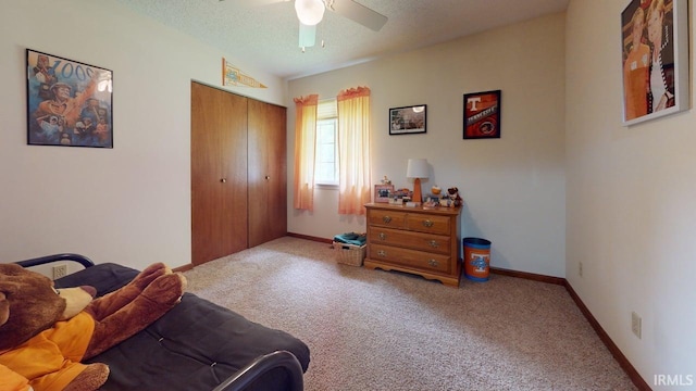 12 Vicki Dr, Vincennes, IN 47591 - bedroom featuring a closet, carpet, baseboards, a textured ceiling, and ceiling fan