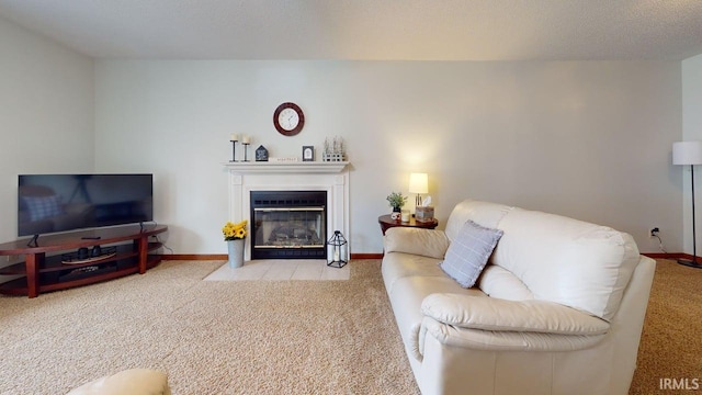 12 Vicki Dr, Vincennes, IN 47591 - carpeted living area featuring a fireplace with flush hearth and baseboards