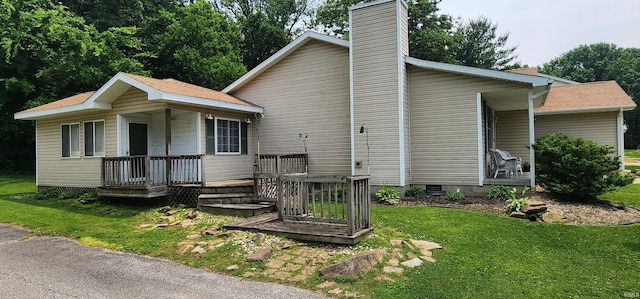12 Vicki Dr, Vincennes, IN 47591 - view of property exterior with a chimney, a yard, and crawl space