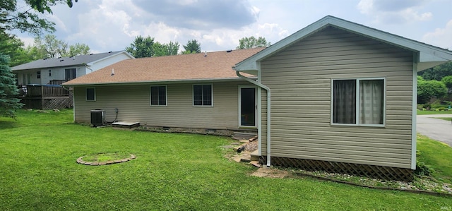 12 Vicki Dr, Vincennes, IN 47591 - back of house with a yard and central air condition unit
