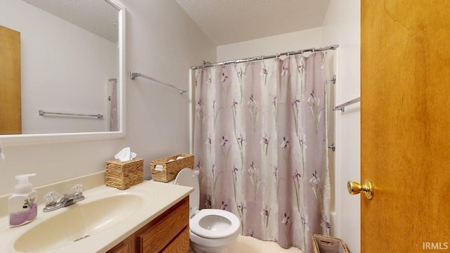 12 Vicki Dr, Vincennes, IN 47591 - full bathroom featuring toilet, vanity, and a textured ceiling
