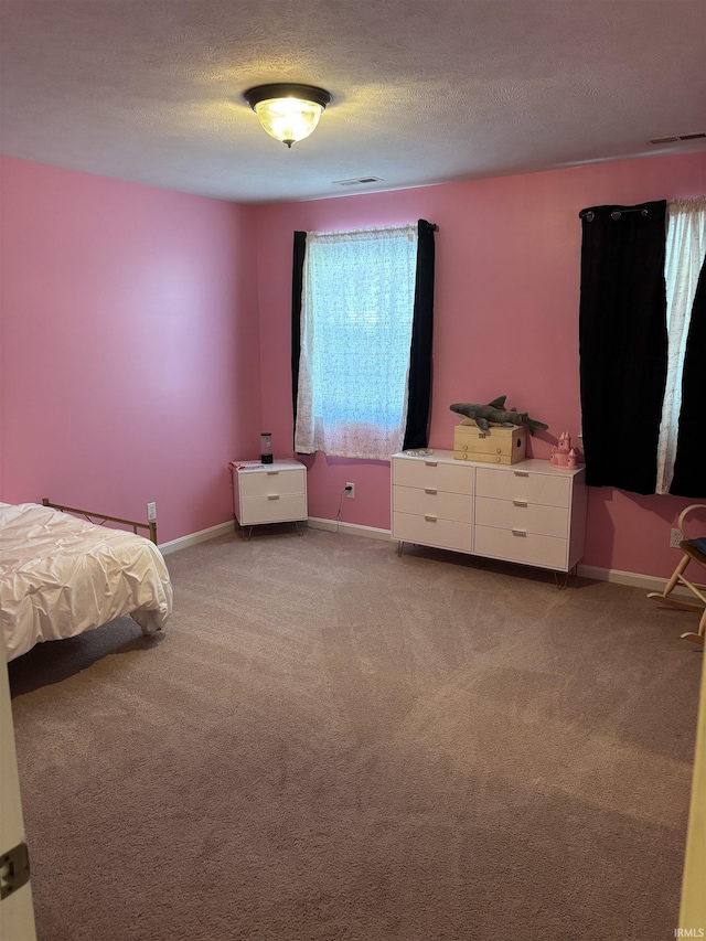 39 Hannah Ln, Jasper, IN 47546 - carpeted bedroom featuring a textured ceiling and baseboards