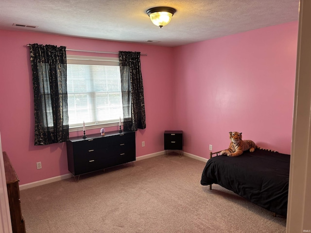 39 Hannah Ln, Jasper, IN 47546 - bedroom with light carpet, a textured ceiling, and baseboards