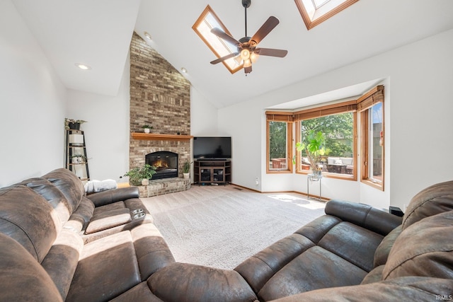 521 Glenmoor Dr, Fort Wayne, IN 46804 - living area featuring carpet, baseboards, ceiling fan, high vaulted ceiling, and a brick fireplace