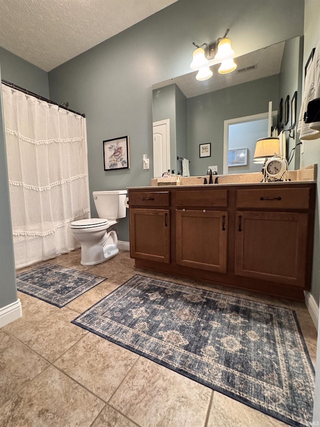 4691 Flagship Ln, Lafayette, IN 47909 - full bath featuring toilet, vanity, baseboards, a shower with curtain, and a textured ceiling