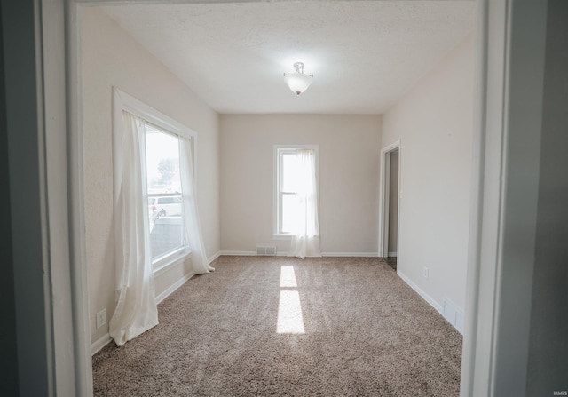 1014 W 7th St, Mishawaka, IN 46544 - spare room featuring carpet and baseboards