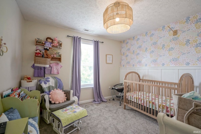 460 Kettle Cir, Lafayette, IN 47905 - carpeted bedroom featuring a textured ceiling and wainscoting