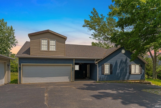 2890 W 400 N, Columbia City, IN 46725 - traditional-style home with driveway, a garage, and roof with shingles