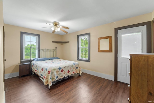 2890 W 400 N, Columbia City, IN 46725 - bedroom with multiple windows, wood finished floors, and a ceiling fan